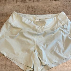 Like new , Athleta run with it 3.5” short size small